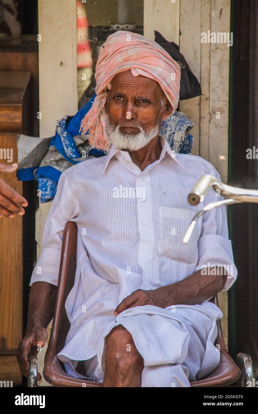 Shop Keeper , Market in Mumbai Stock Photo