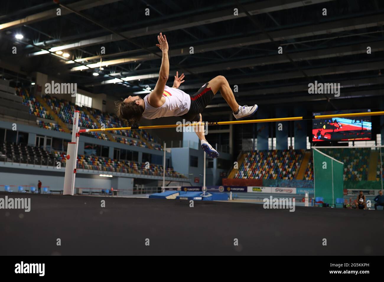 ISTANBUL, TURKEY - MARCH 06, 2021: Undefined athlete high jumping ...