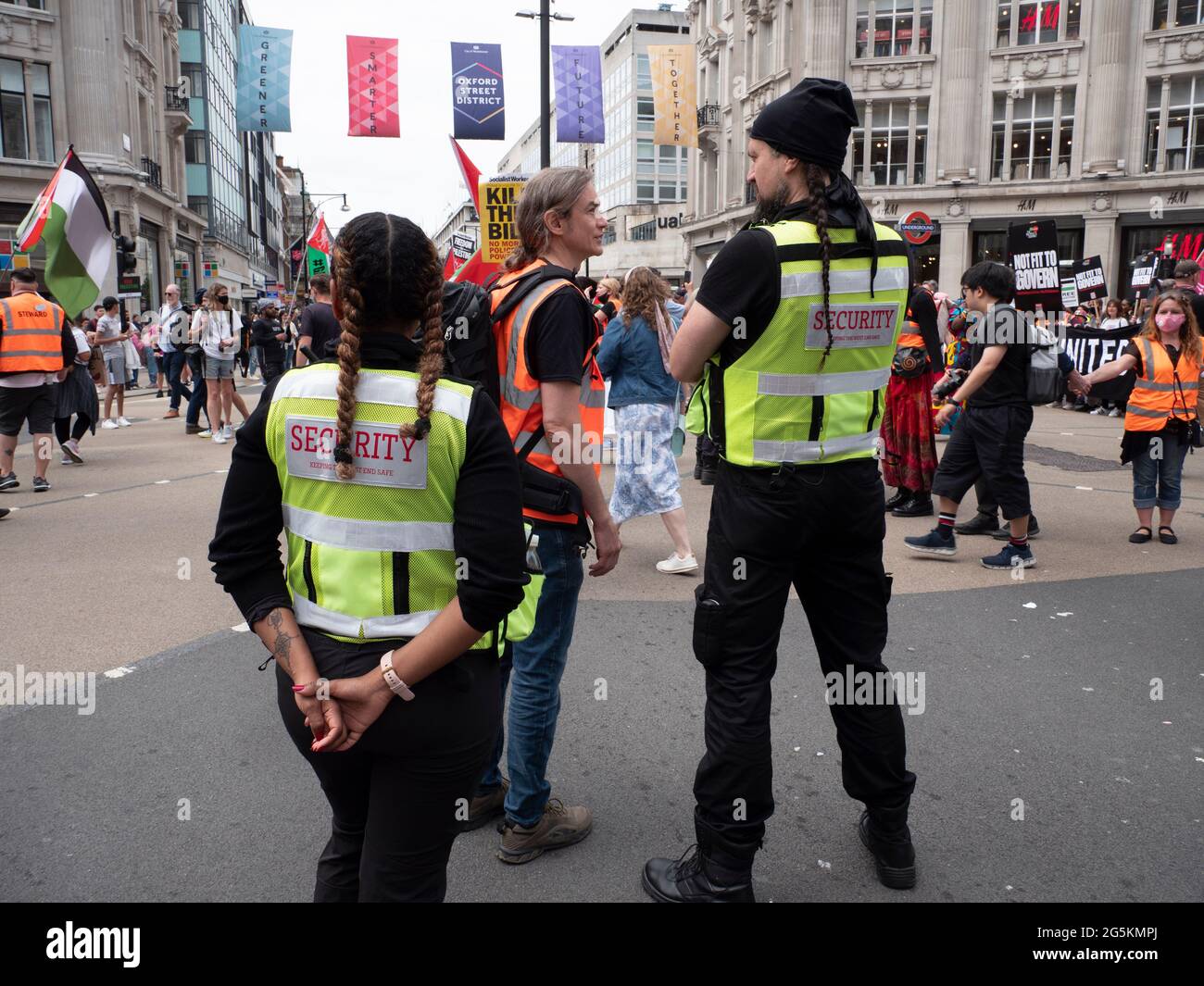 New West End Company Oxford Street private security guards at London  protests, Activists protest in Central London at the People's Assembly  National Demonstration Stock Photo - Alamy