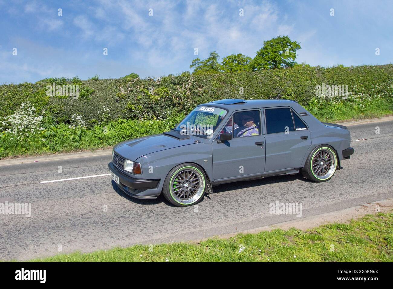1988 90s grey Skoda LSE 4dr saloon, 1289cc petrol en-route to Capesthorne Hall classic May car show, Cheshire, UK Stock Photo