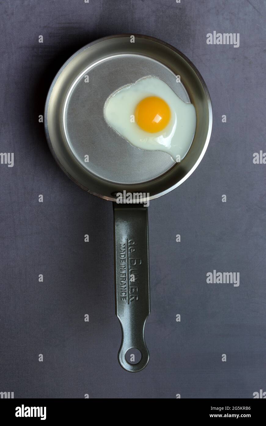 Quail egg in frying pan fried egg Stock Photo
