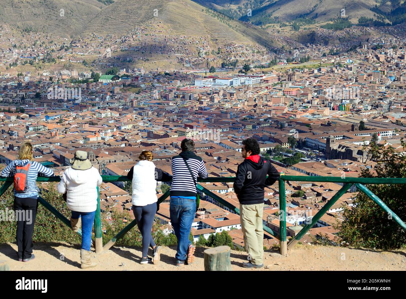 People looking at the city of Cusco, Peru, from a viewpoint, South America Stock Photo