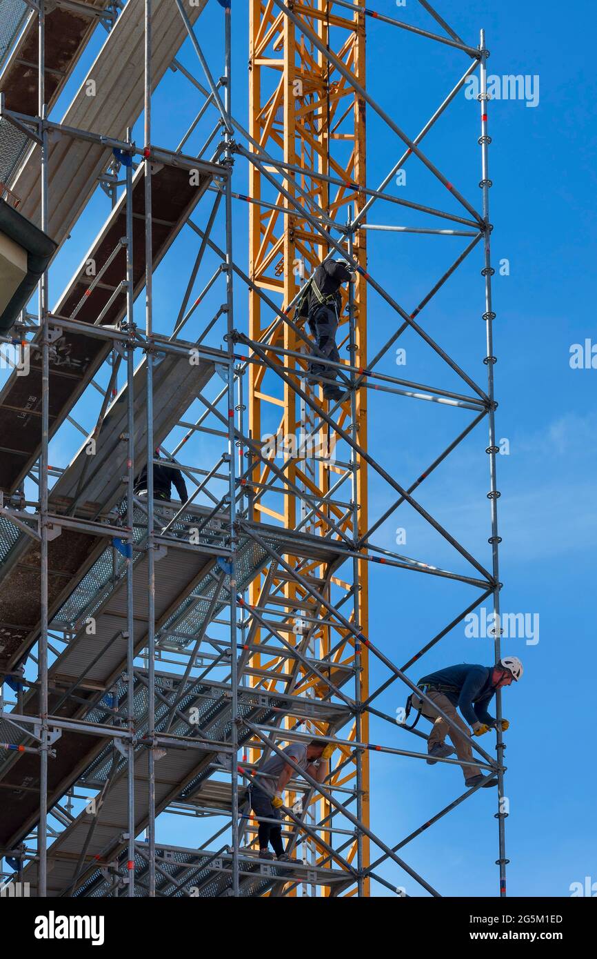 Worker on scaffolding, Munich, Upper Bavaria, Bavaria, Germany, Europe Stock Photo