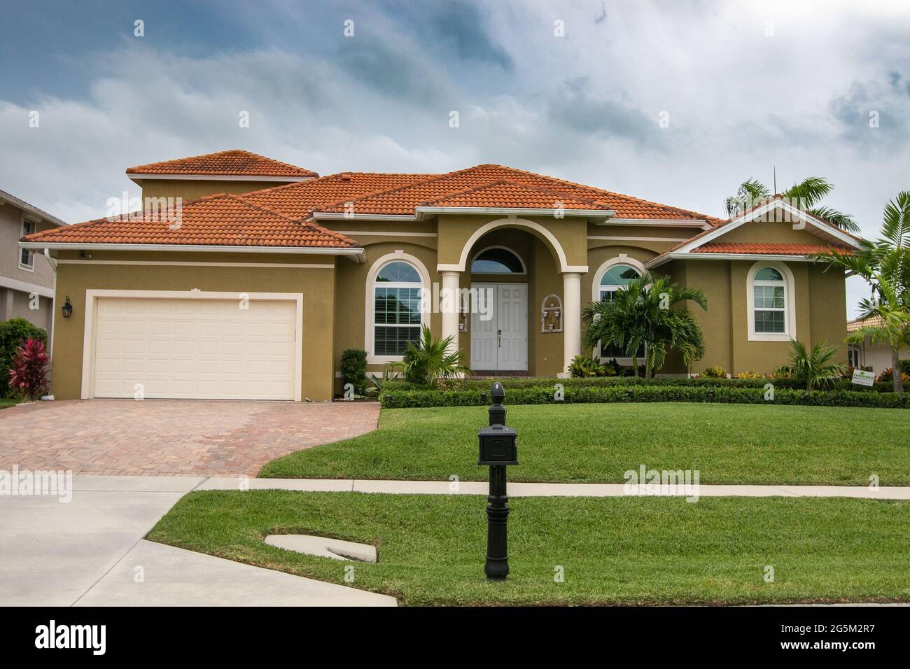 Typical private home at an affluent residential area on Marco Island, Florida. Stock Photo