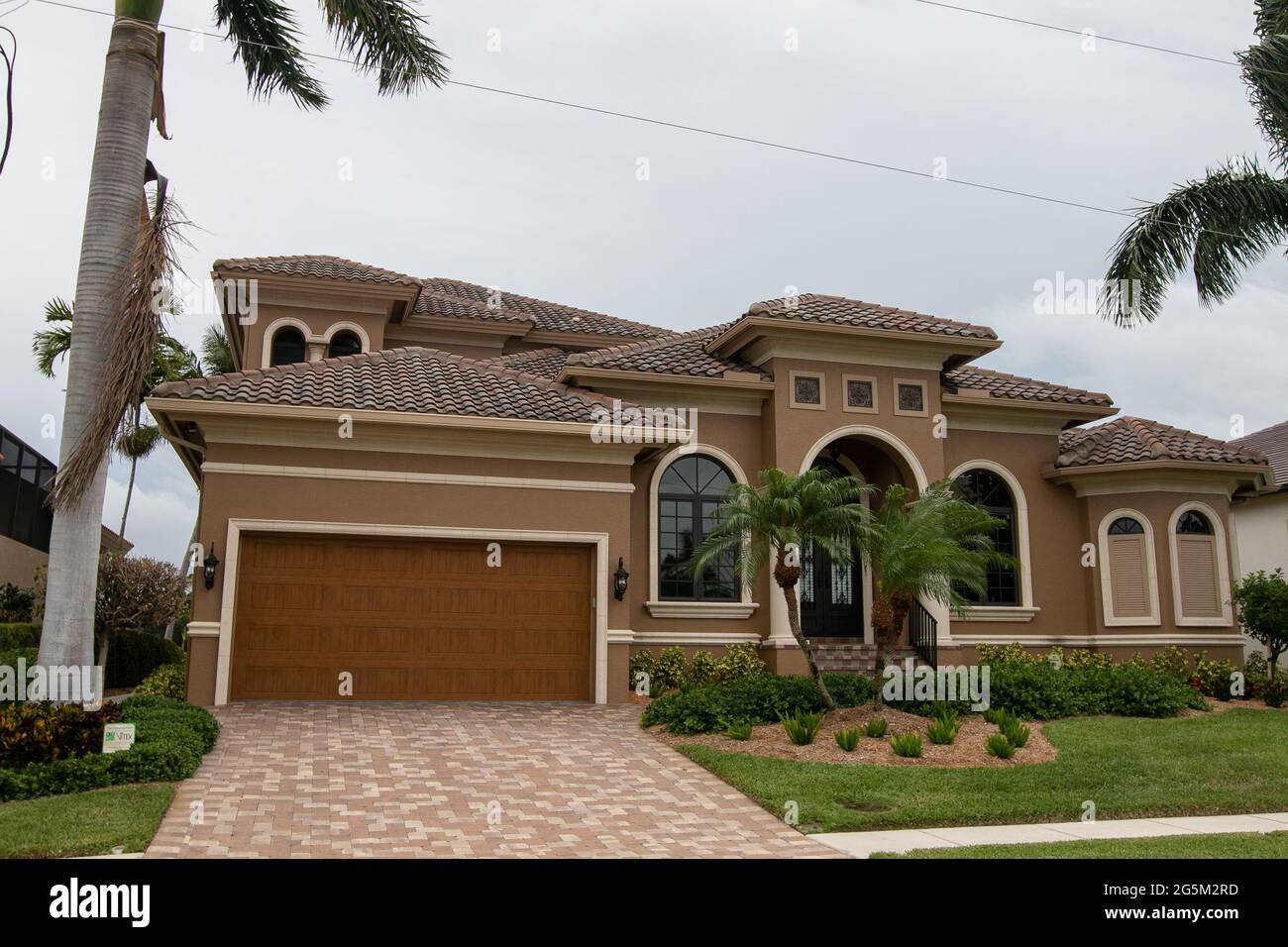 Typical private home at an affluent residential area on Marco Island, Florida. Stock Photo