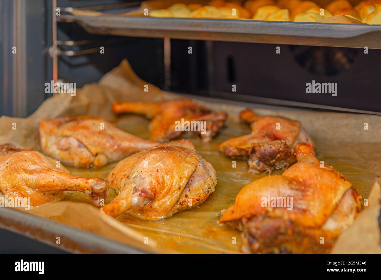 Oven baked duck legs. Roast duck.Duck baked with potatoes in the oven