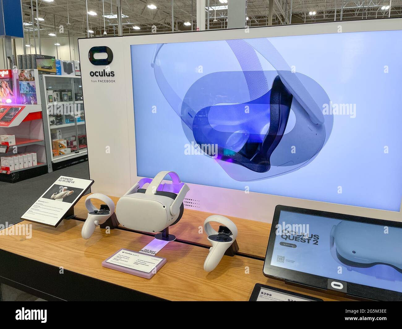 Oculus - a virtual reality console - is offered for sale at a Best Buy store. Stock Photo