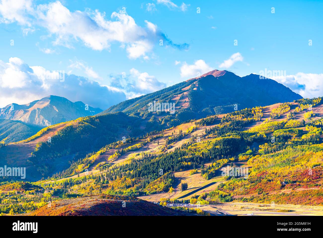 View of Aspen city, Colorado USA and buttermilk ski slope hill in rocky mountains peak with