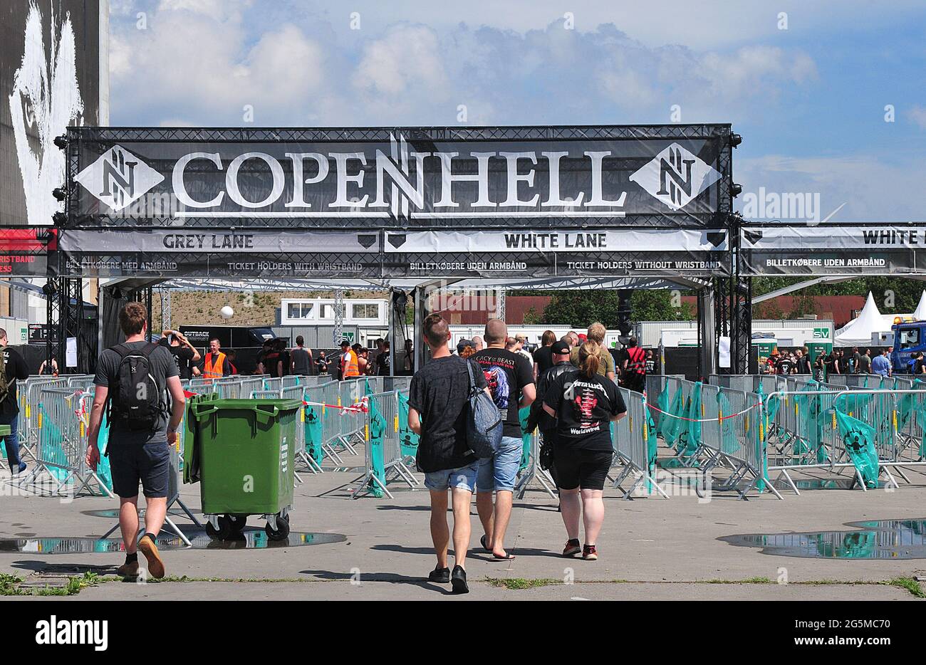 Copenhagen /Denmark./ 20 June 2019/Fans arriving to Copenhell metal music  festival on amager in danish capital Copenhagen 100 and 100 aiting for bus  t Stock Photo - Alamy