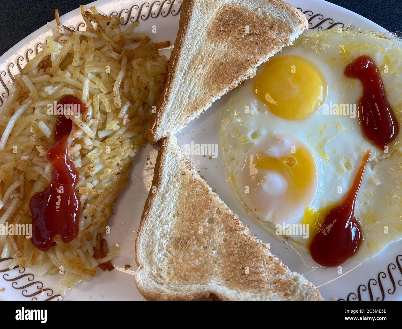 Eggs and hash browns breakfast served at Waffle House, Virginia Stock