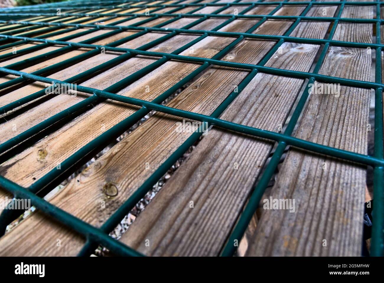 Metal and wood fence, conceptual photography, France Stock Photo