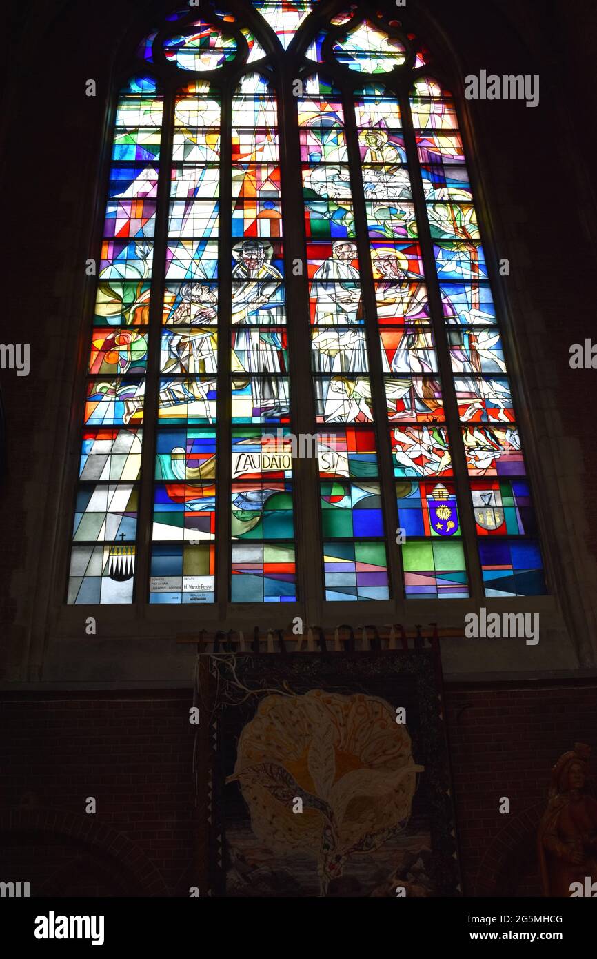 Saint Bavo's Cathedral in Ghent, Belgium. Stained glass. Stock Photo