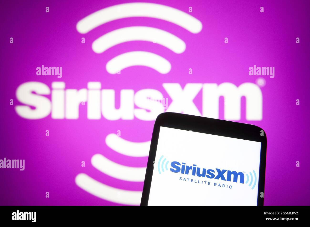 Ukraine. 28th June, 2021. In this photo illustration, Sirius XM Holdings  logo of an US satellite radio is seen on a smartphone and a pc screen.  Credit: SOPA Images Limited/Alamy Live News
