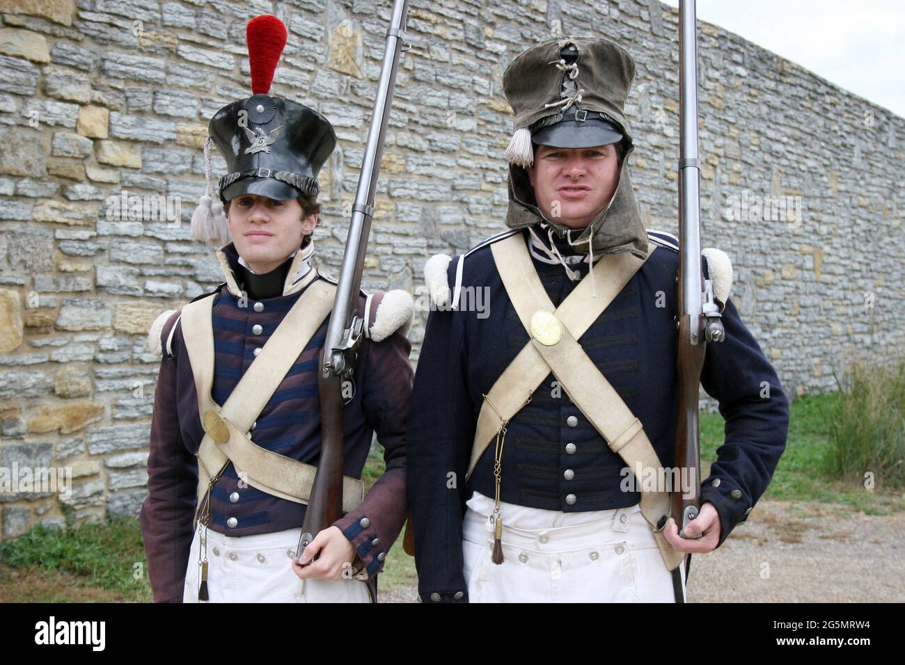 Military reenactors dressed in 1820s uniforms as soldiers of the 5th Infantry Regiment at United States Army outpost of Fort Snelling, Minnesota Stock Photo