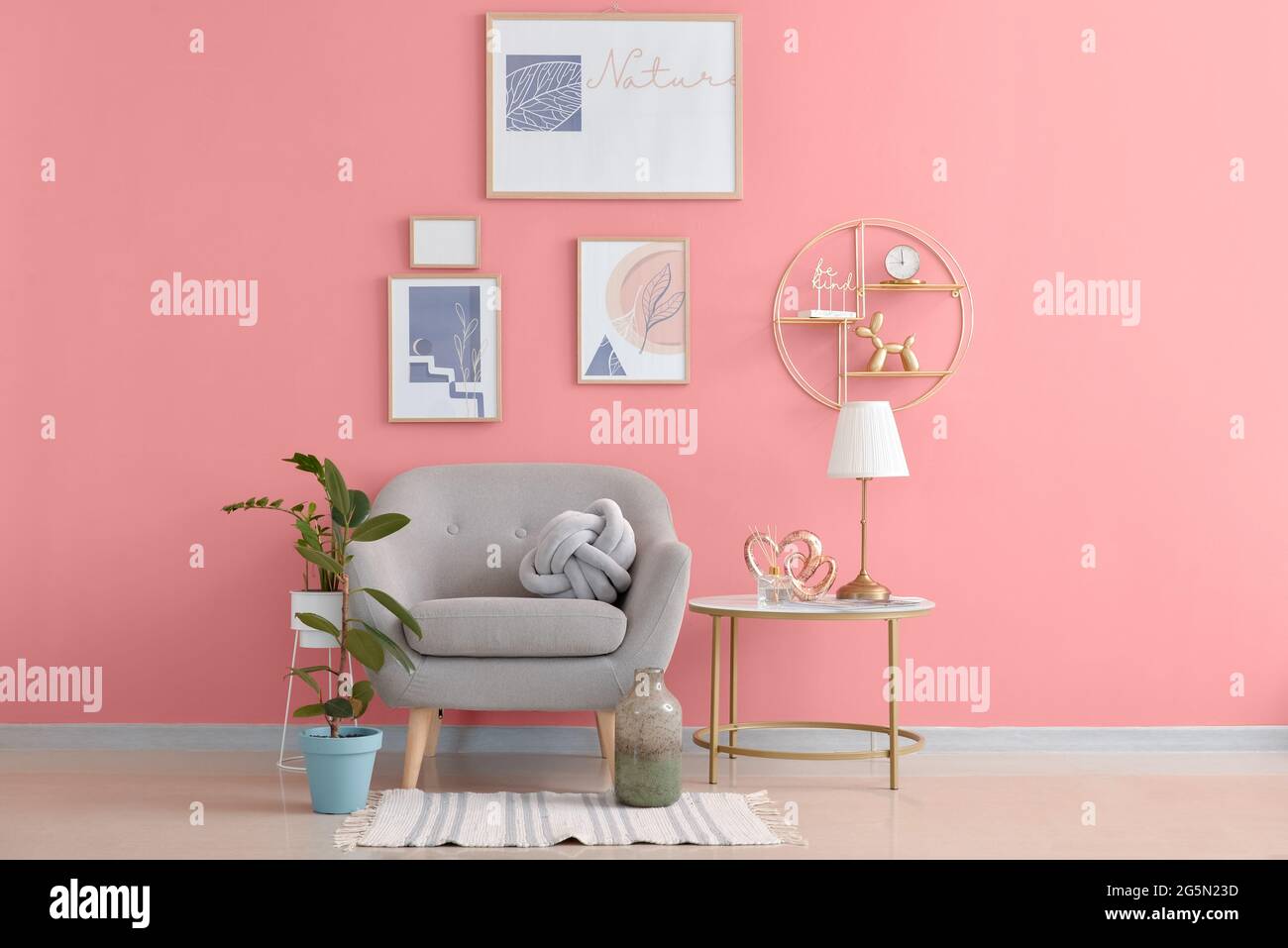 Interior of stylish living room with pictures Stock Photo - Alamy