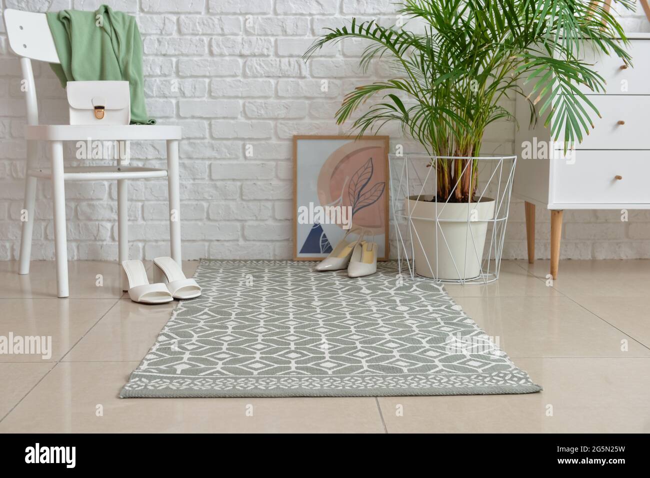 Stylish rug in interior of modern hallway Stock Photo - Alamy
