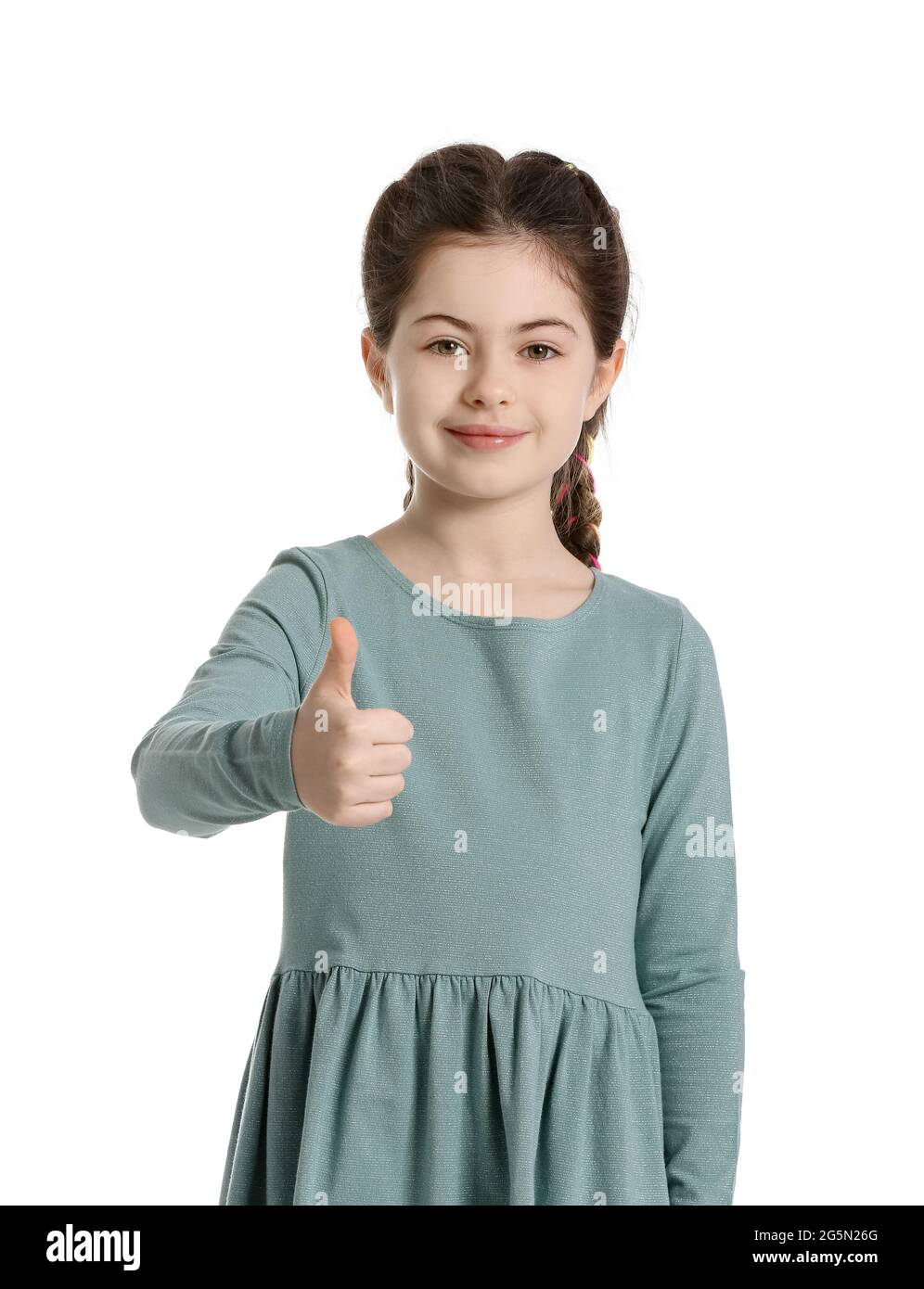 Little girl showing thumb-up on white background Stock Photo - Alamy