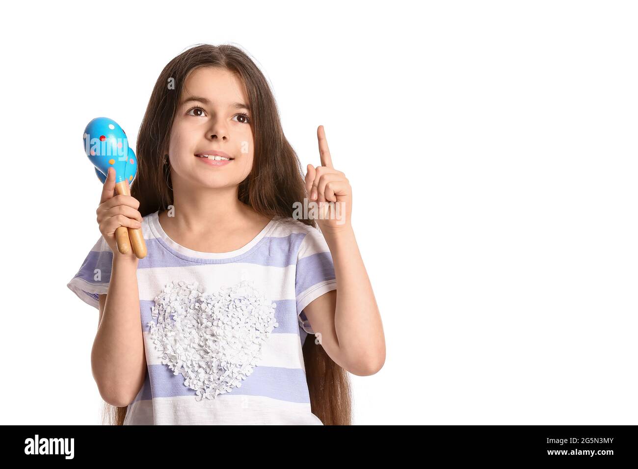 cute-mexican-girl-with-maracas-showing-something-on-white-background