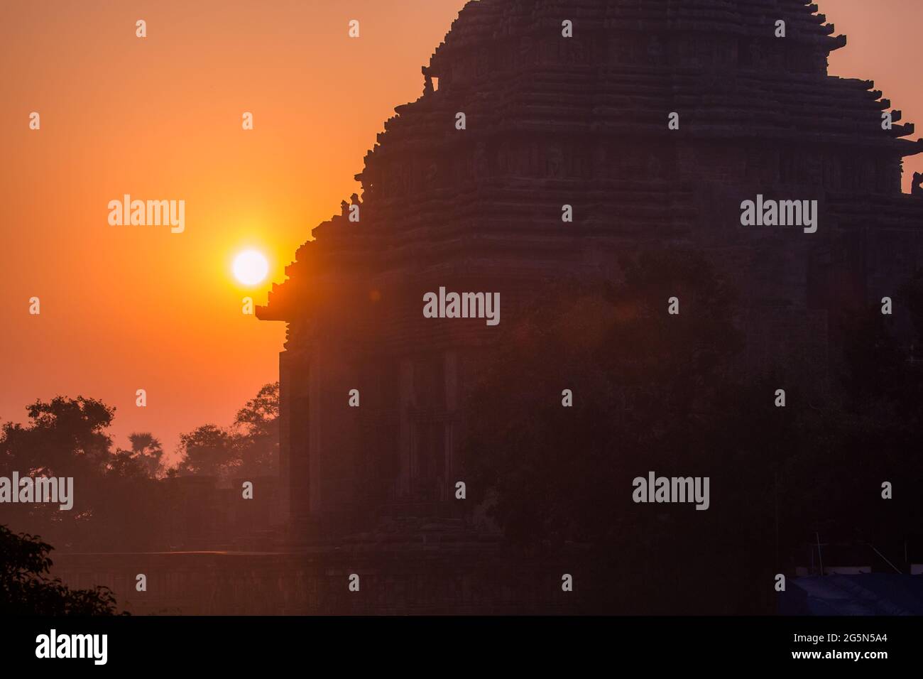 Silhouette of an 800 year old ancient temple at Konark, Odisha. UNESCO World Heritage. Sun Temple at Sunrise. Stock Photo