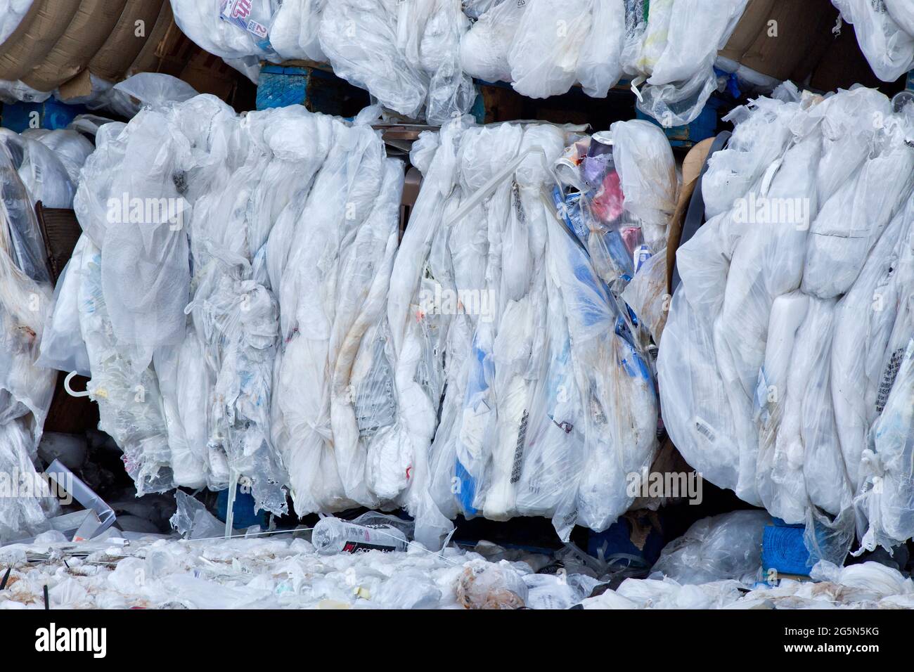 Compacted, baled plastics to be recycled. Stock Photo