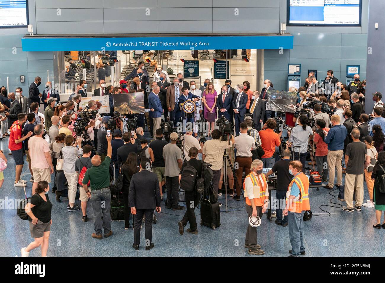 Secretary of Transportation Pete Buttigieg speaks at press conference with Senator Charles