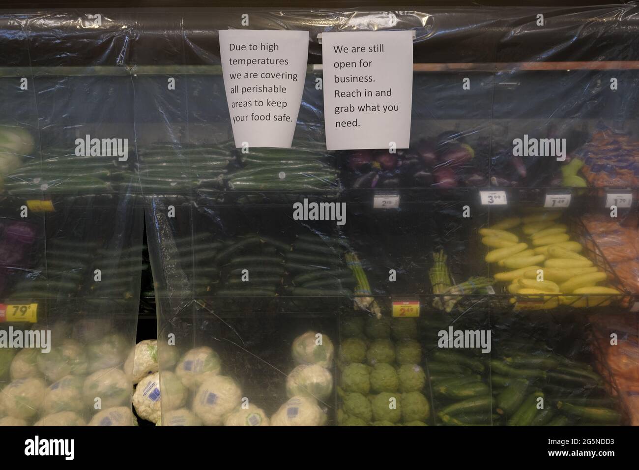 Perishable items are covered with a layer of plastic to keep in the cool air at a Fred Meyer grocery store in Portland, Ore., on June 28, 2021, where temperatures reached an all time high of 116 degrees Fahrenheit. (Photo by Alex Milan Tracy/Sipa USA) Stock Photo