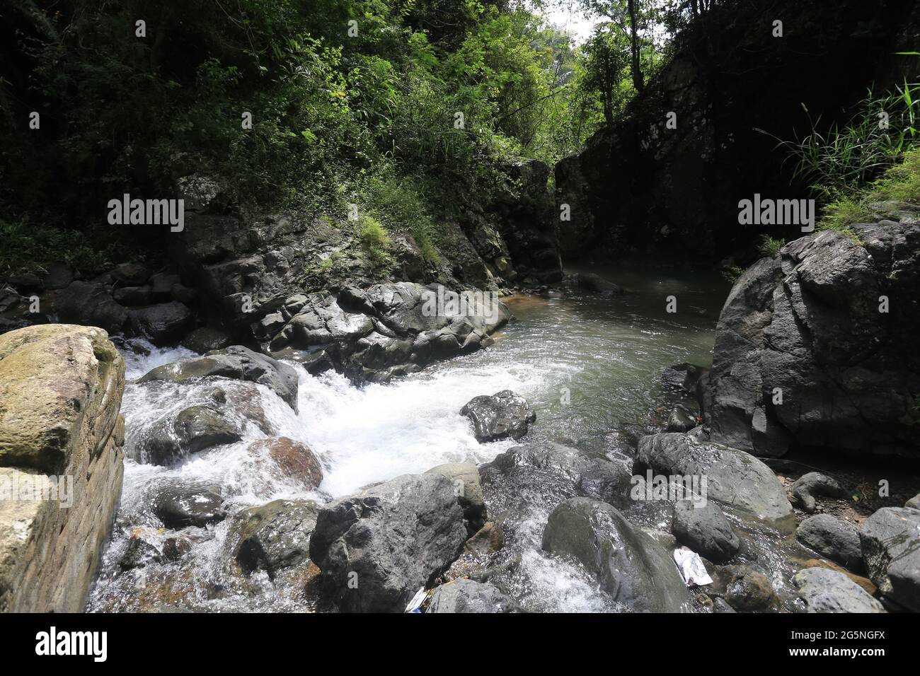 River and water falls runs on sediment rocks at West Java Indonesia ...