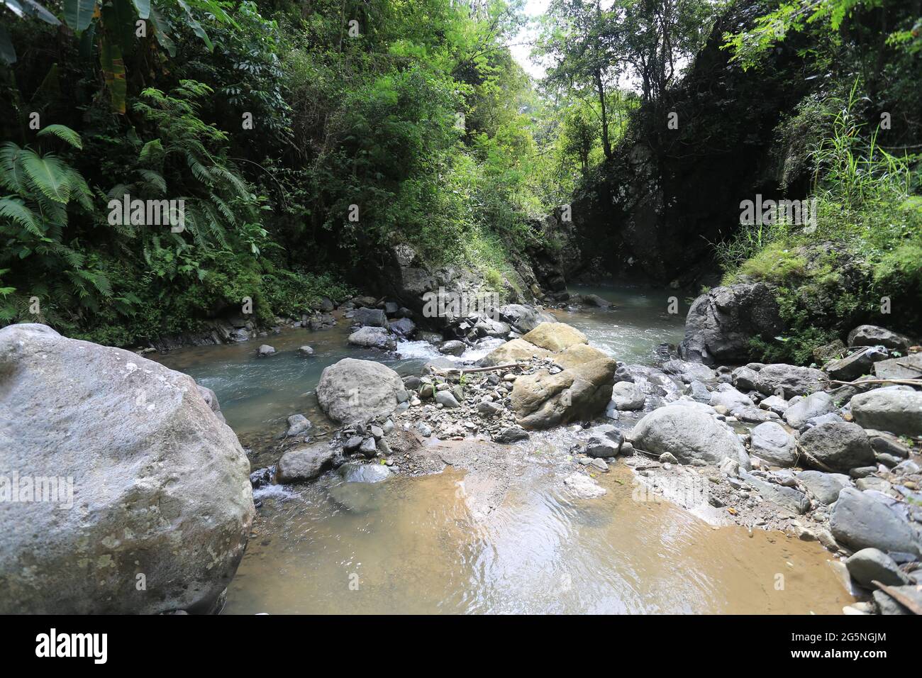 River and water falls runs on sediment rocks at West Java Indonesia ...