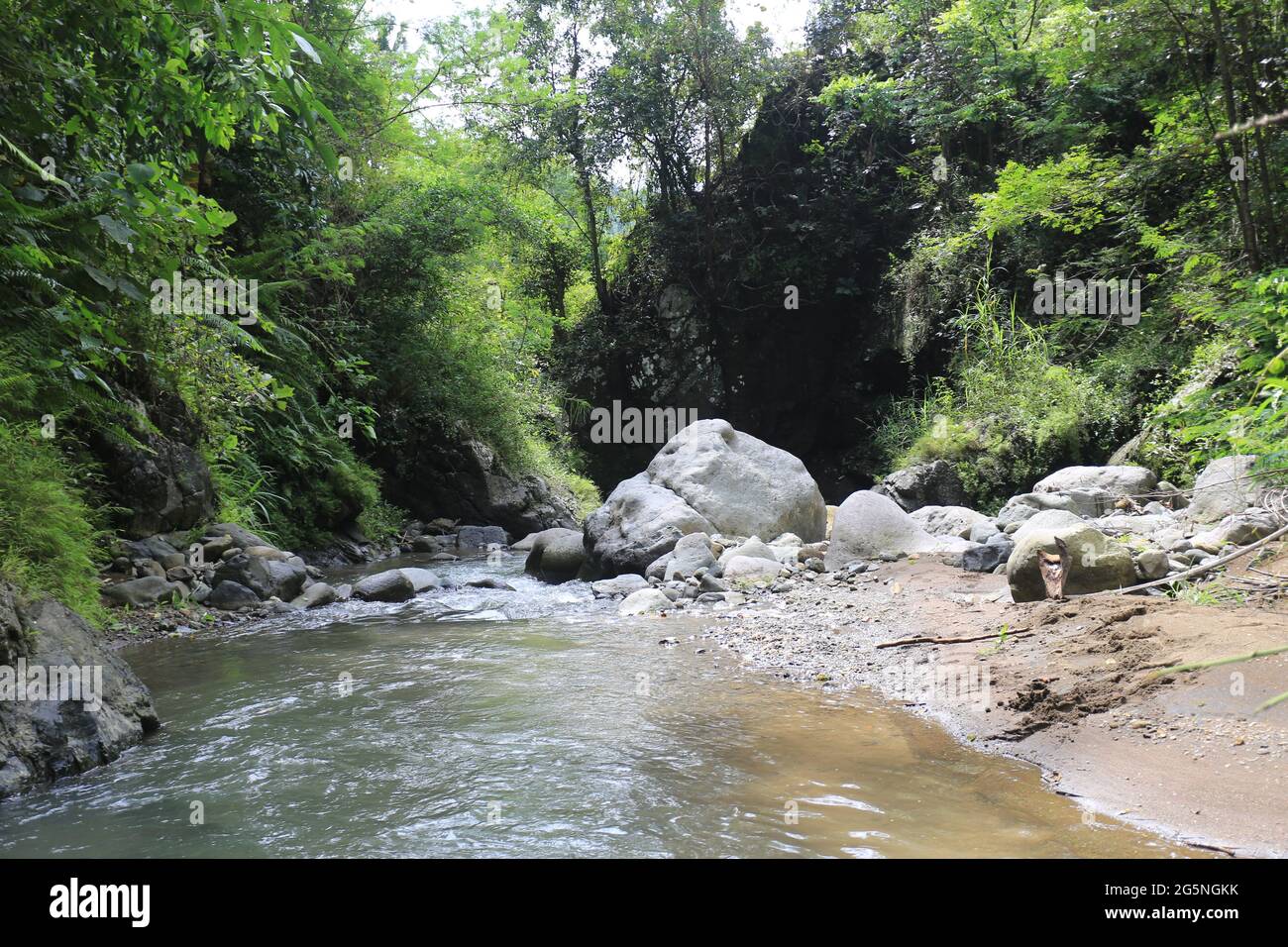 River and water falls runs on sediment rocks at West Java Indonesia ...
