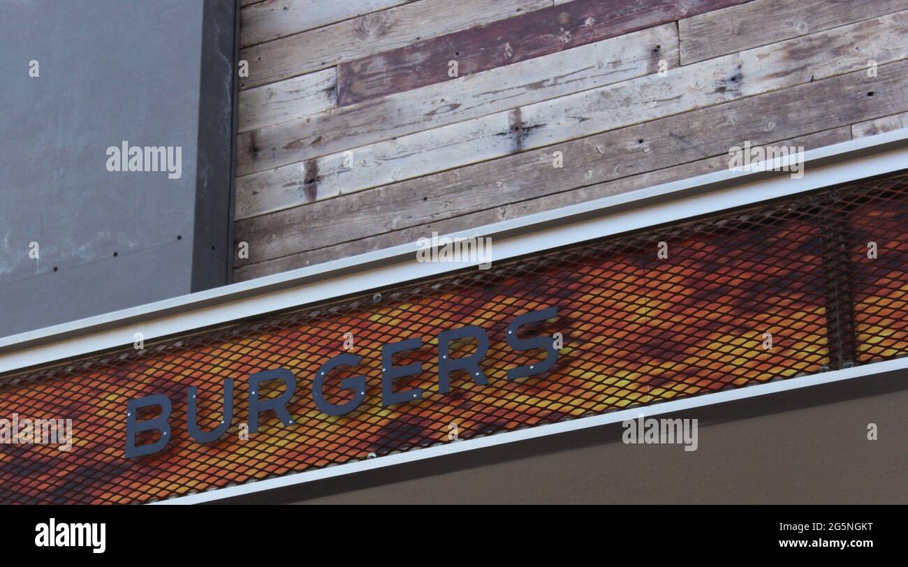 Burger Sign on Rustic Background, Local Restaurant Stock Photo - Alamy