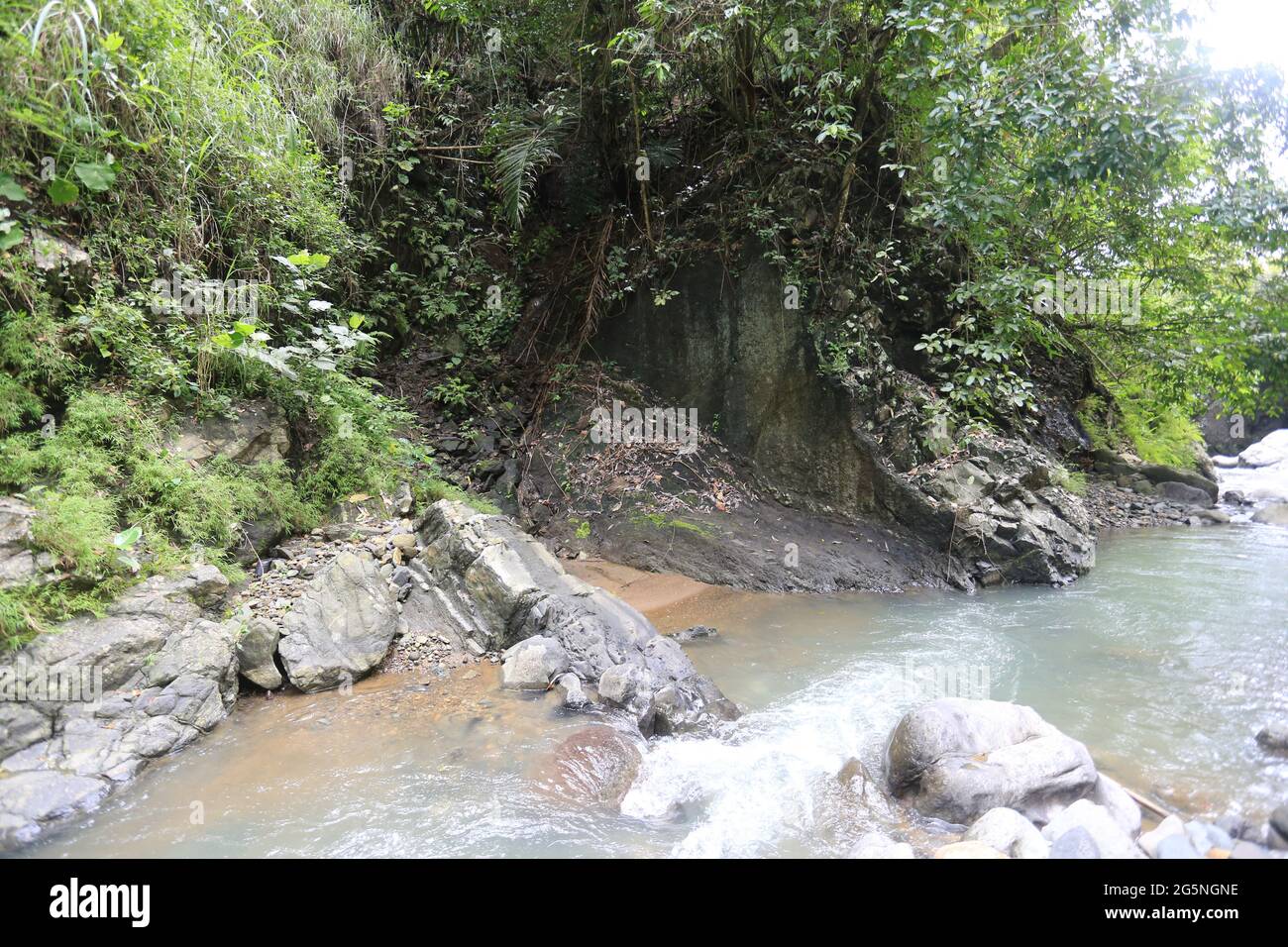 River and water falls runs on sediment rocks at West Java Indonesia ...