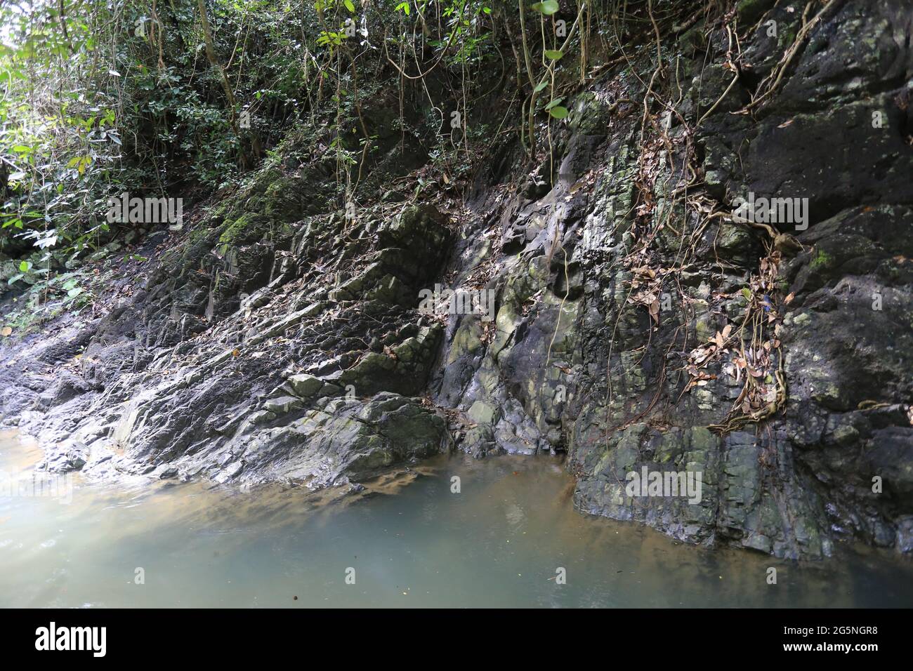 River and water falls runs on sediment rocks at West Java Indonesia ...