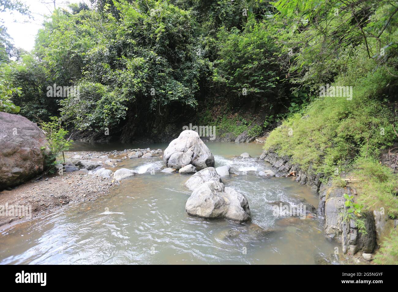 River and water falls runs on sediment rocks at West Java Indonesia ...