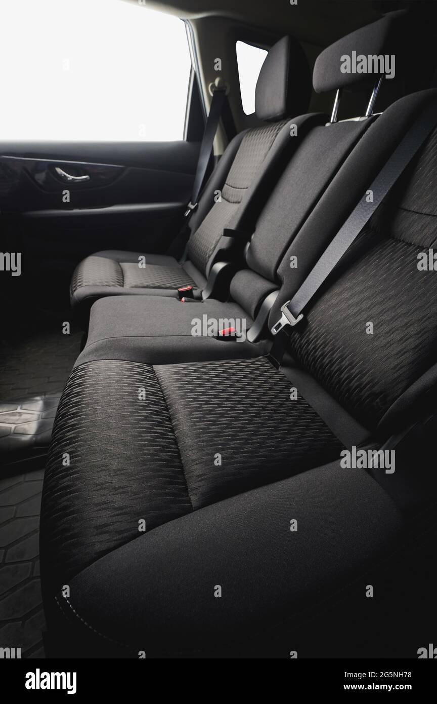 Comfort clean black cloth seats back side view Stock Photo