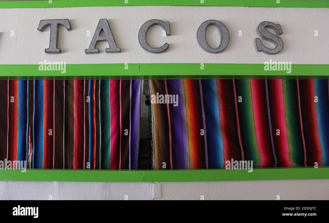 Closed Taco Stand With Colorful Curtains Stock Photo