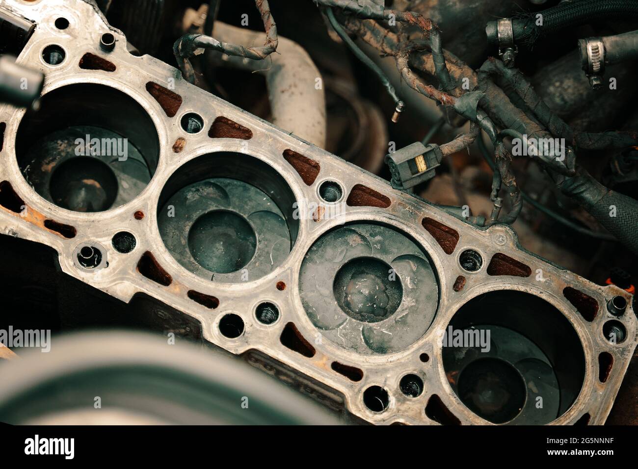 Pistons and cylinder head of engine block vehicle. Motor capital repair