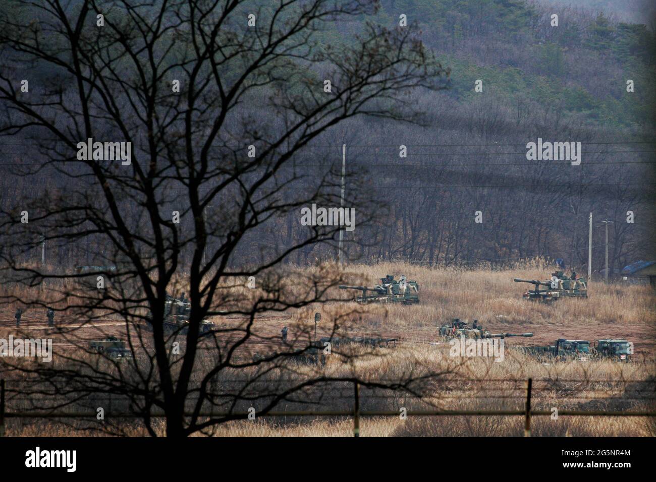 A South Korea and U.S. Army soldier take part in an annual exercise in Yeoncheon, near the border with North Korea. North Korea on Monday issued its latest belligerent threat, warning of an indiscriminate 'pre-emptive nuclear strike of justice' on Washington and Seoul, this time in reaction to the start of huge U.S.-South Korean military drills. Stock Photo