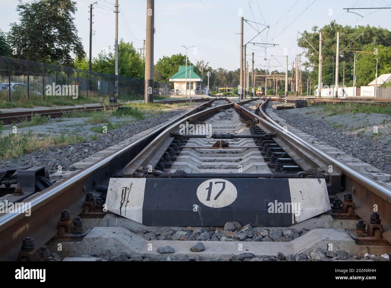 Arrow Rails. Rail and concrete sleepers closeup Stock Photo - Alamy