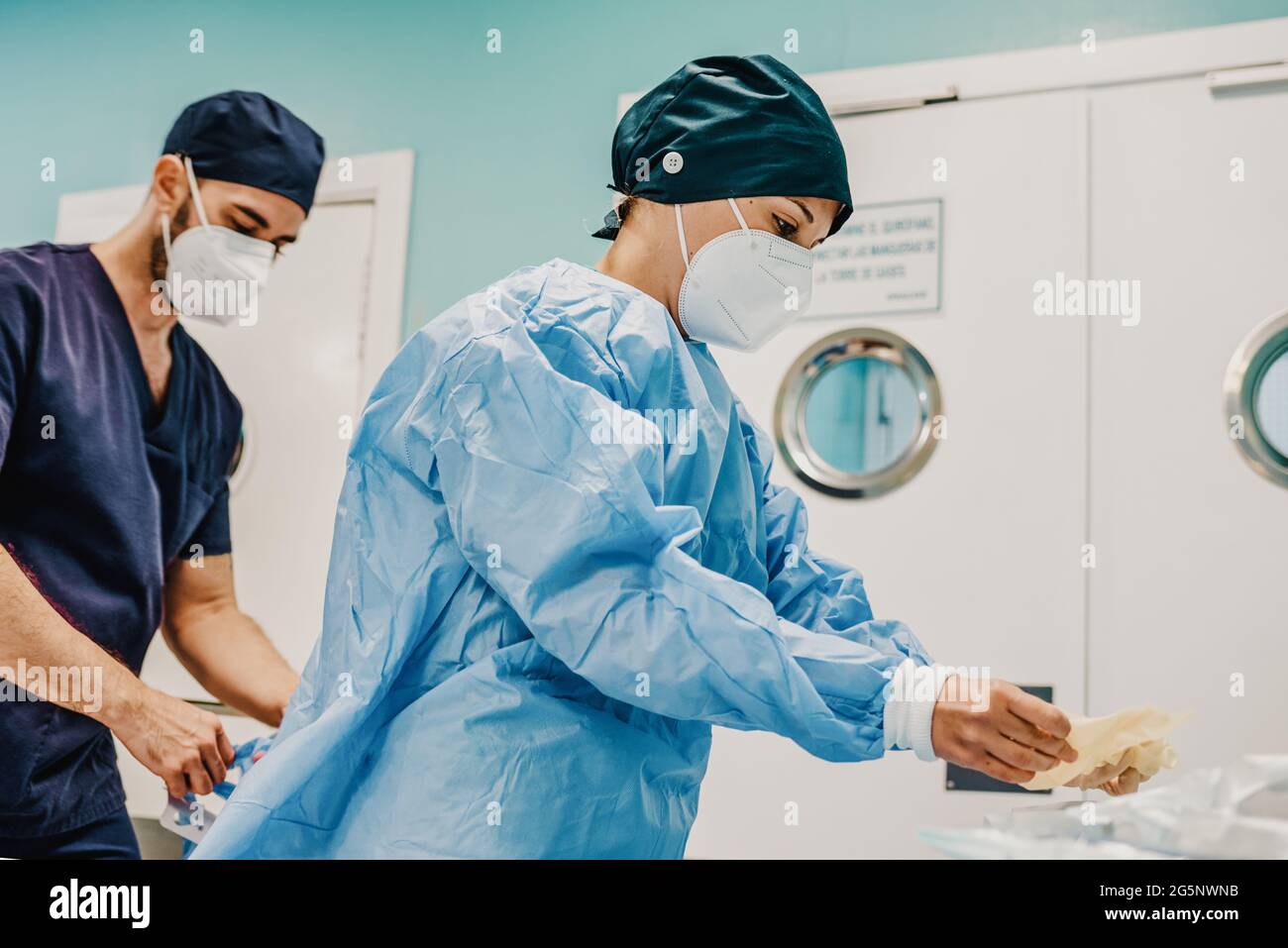 Medical doctors preparing for surgical operation inside modern hospital  Stock Photo