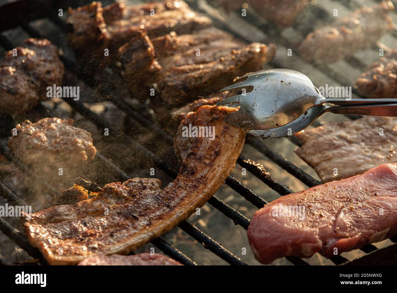 Grilled meat cook detail with smoke , cooking grilled meat Stock Photo ...