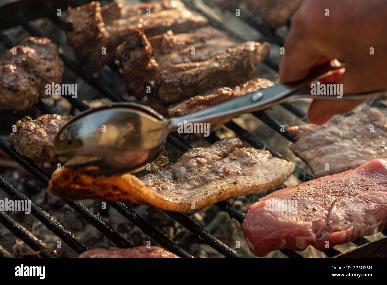 Grilled meat cook detail with smoke , cooking grilled meat Stock Photo ...
