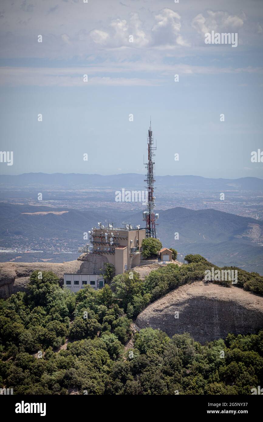 Cell tower (Base station or base radio station) on the top of Montserrat,  Mountain, Catalonia, Spain. View from above. Aerial view Stock Photo - Alamy
