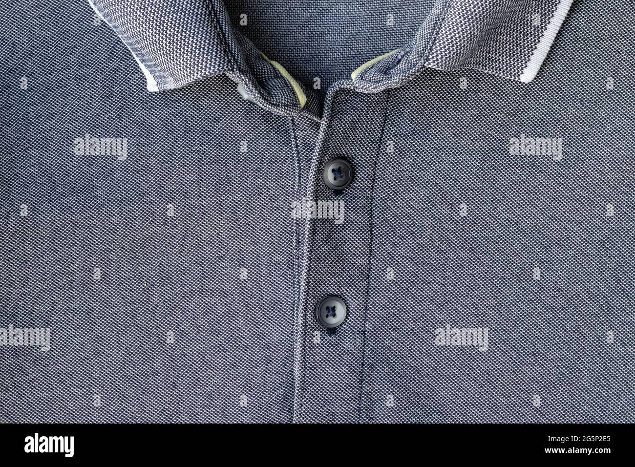 Jersey cotton fabric tshirt with collar and buttons texture. Gray textile polo background Stock