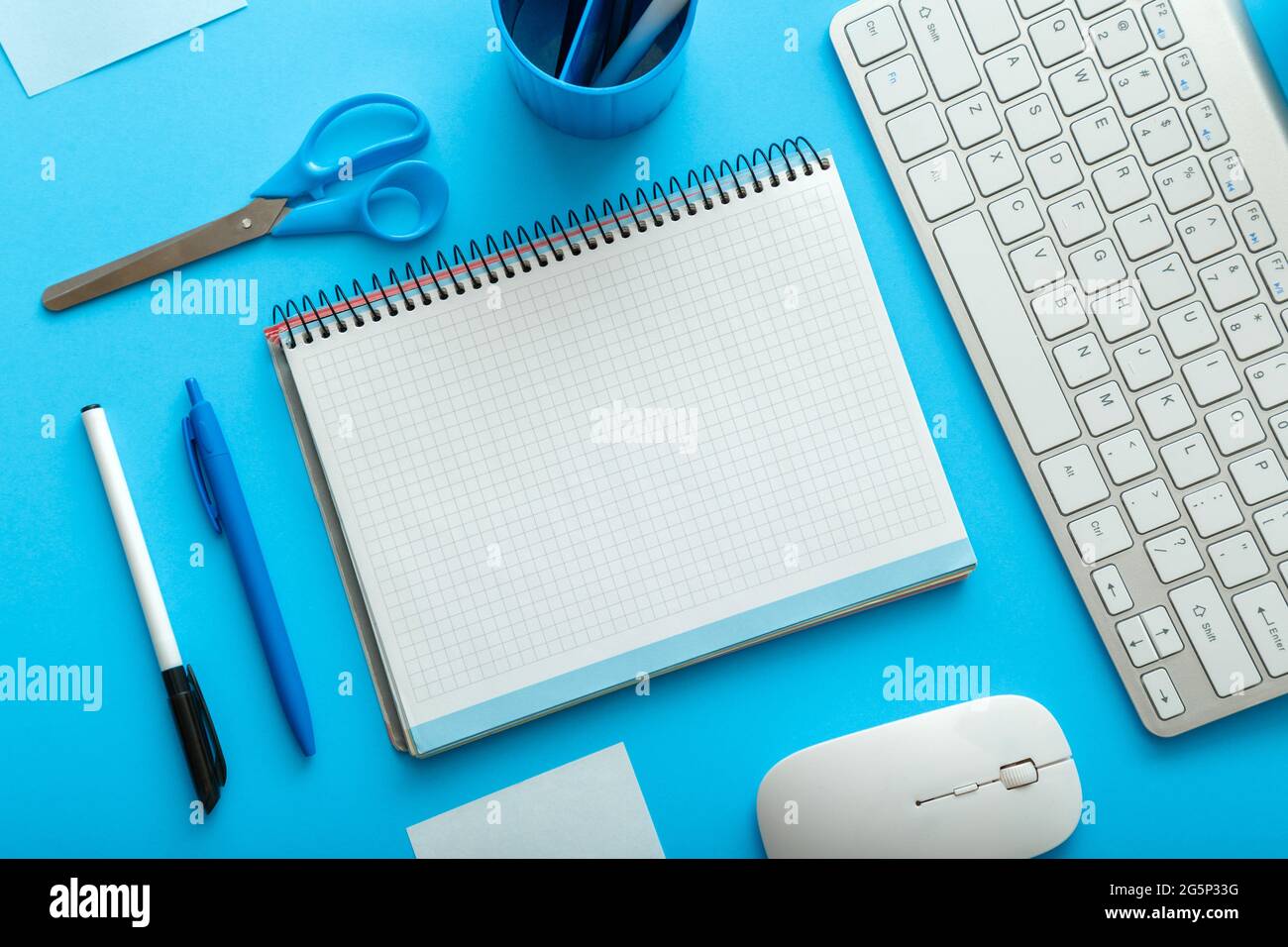 Office and school white blue stationery on pastel blue layout for work ...