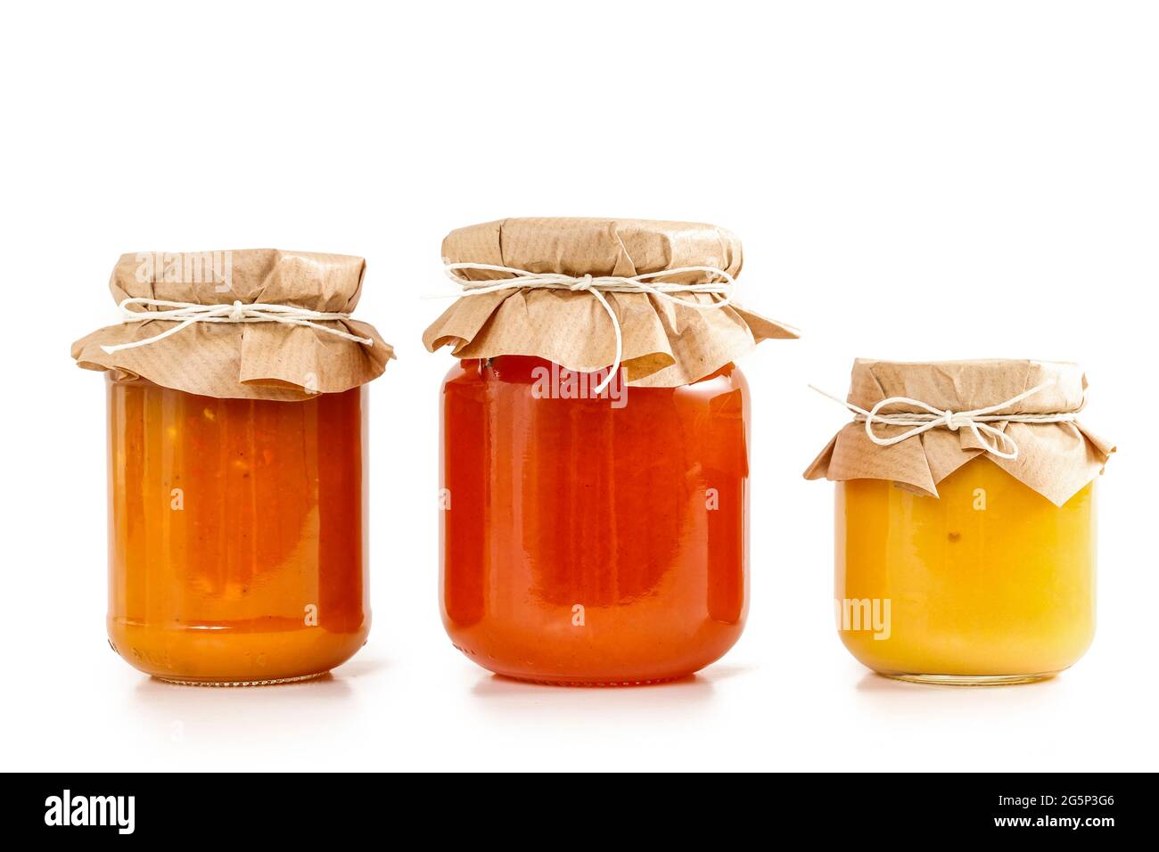 Colorful jams in glass jars isolated on white background Stock Photo