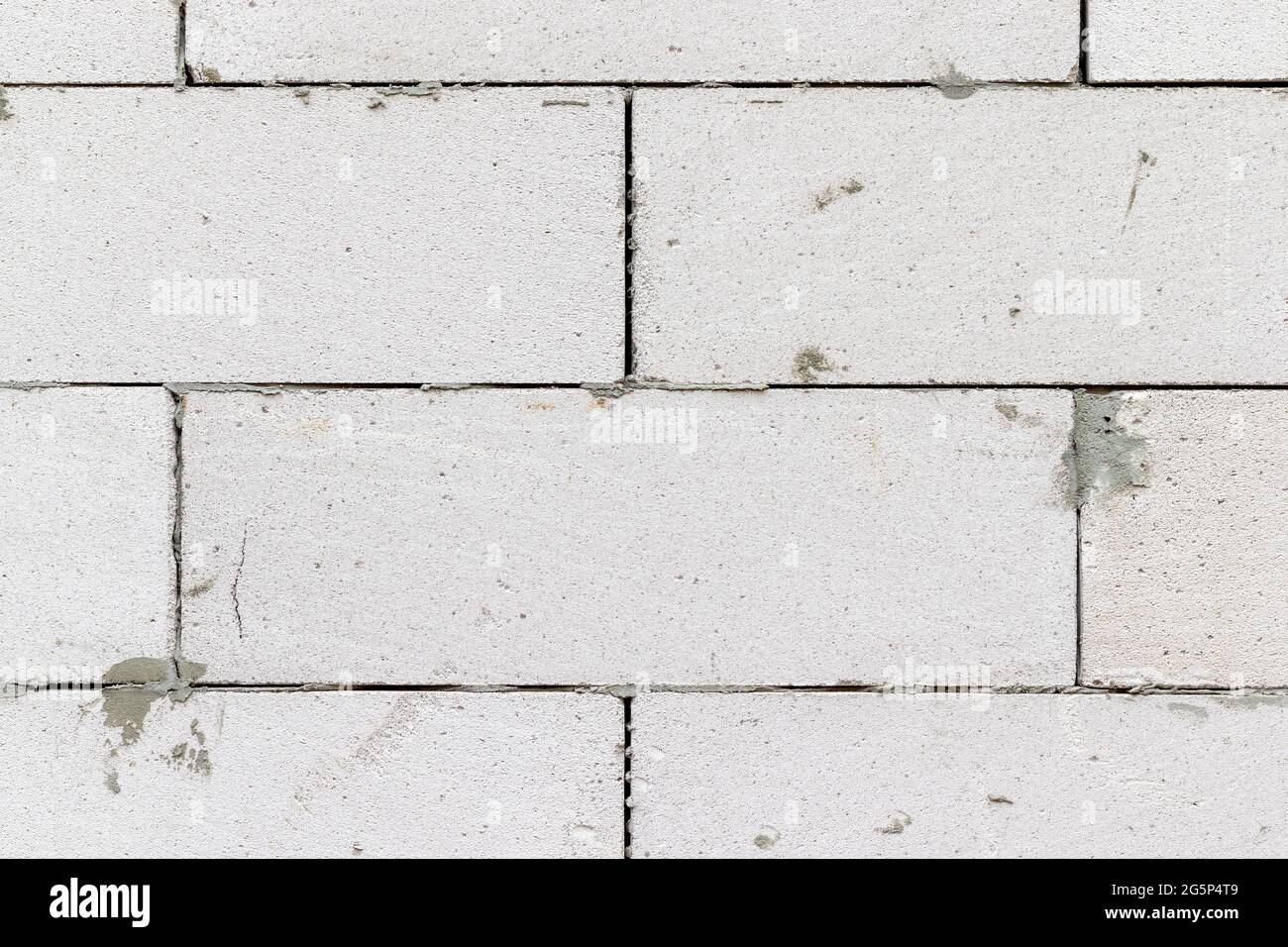 Smooth white brick wall with traces of cement background texture Stock ...
