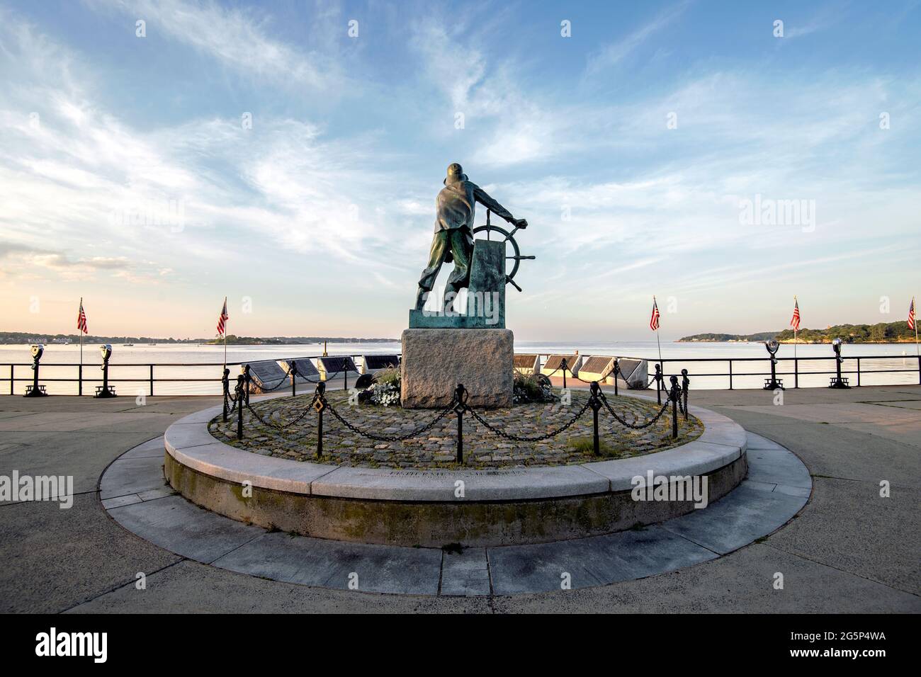 Gloucester, Massachusetts / United States - 2014: Gloucester Fisherman Memorial overlooking Gloucester Harbor. Stock Photo