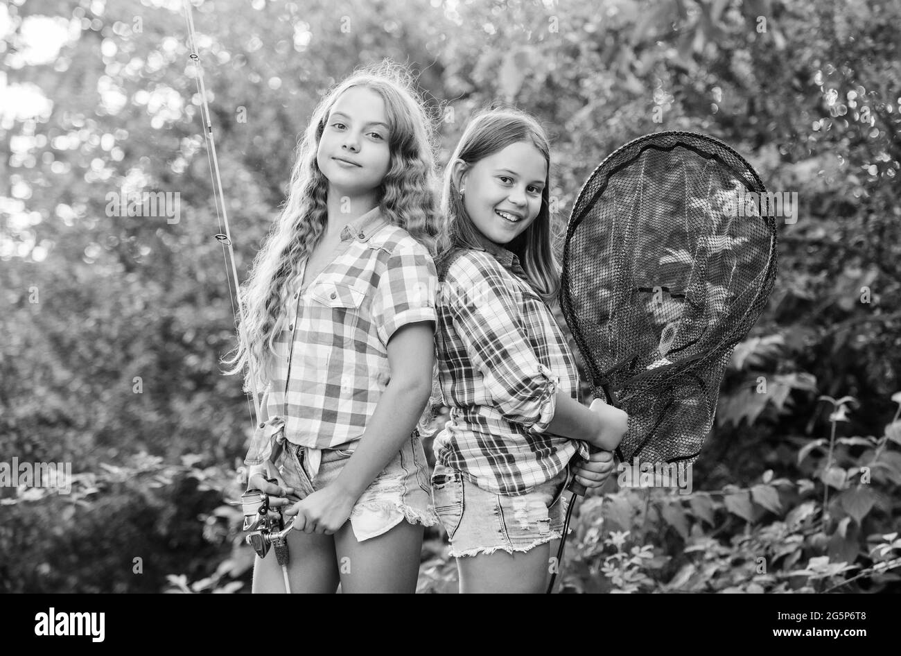 Gone Fishing. two girls fishing. Big game fishing. summer hobby. happy