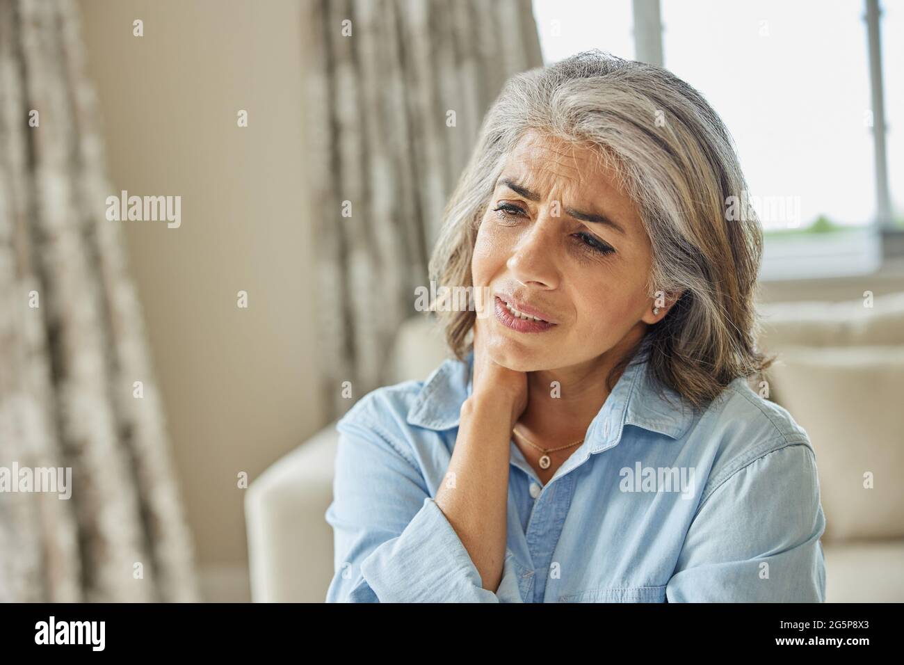 Mature indian woman at home hi-res stock photography and images - Alamy