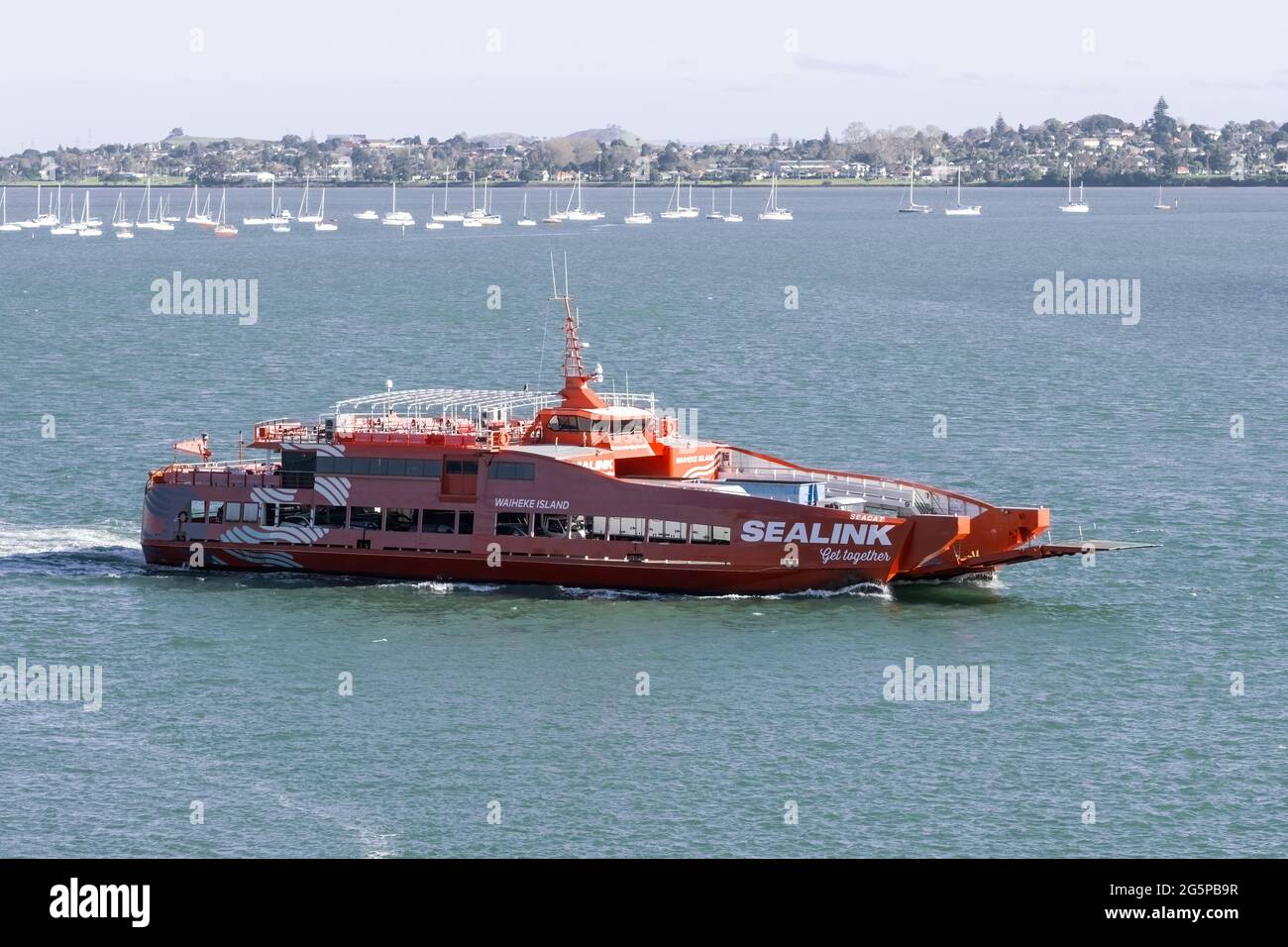 AUCKLAND, NEW ZEALAND Jun 21, 2021 Aerial view of Sealink passenger car ferry riding to